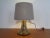 70s floor lamp made of glass from Peil & Putzler.Screen and glass stand can be illuminated separately. This piece has an...