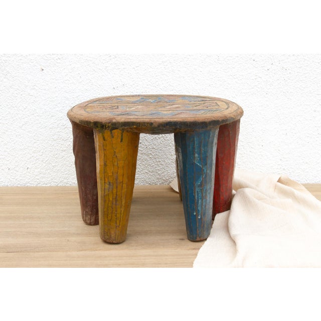 A unique piece of African art, this vintage Nupe table from Nigeria is a must-have for collectors and enthusiasts of Nupe...