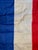 This is a late 20th century vintage flag. It is made of nylon. It represents France. It represents a blend of the...