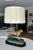 Vintage brass hunting dog figural table lamp featuring a setter or retriever dog sculpture on a dark wood base. Newly...