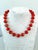 Lovely coral and Jade beaded necklace designed by Matthew Izzo. 13mm coral beads