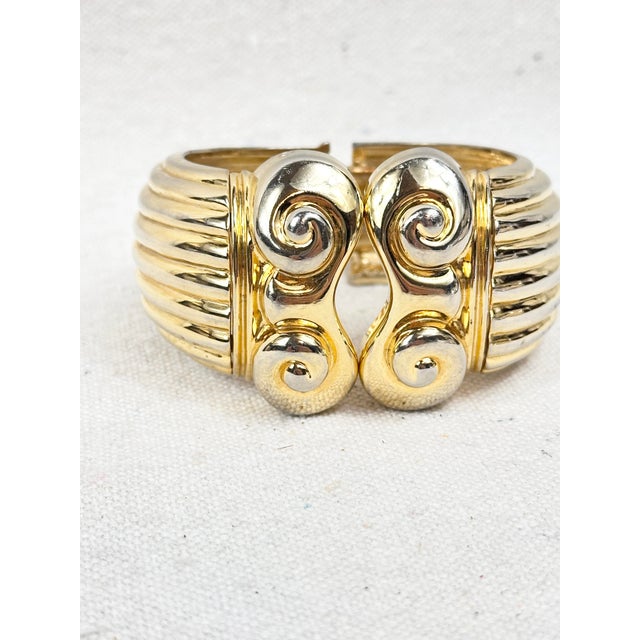 Make a striking statement with this exceptional vintage Greek Revival clamper cuff bracelet. Modeled after classical...