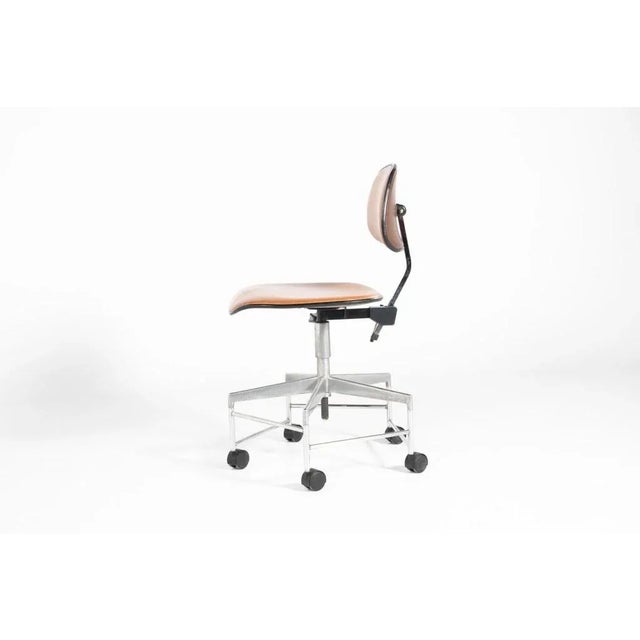 Danish architectural armchair from Jacob Jensen for Labofa Mobler. Polished steel & aluminium frame construction with...