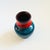 A mid century West German Pottery vase by Bay Keramik. Finished in a two toned red and blue glaze with a brown interior....