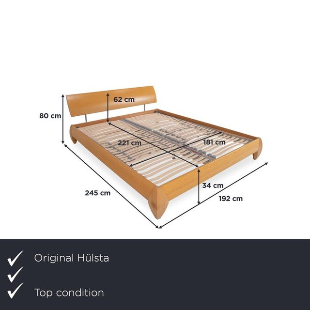 We present to you the Hülsta wooden bed in brown. I have official proof of authenticity such as vintage catalogs, designer...