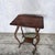 An elegant British Arts and Crafts occasional table in walnut, with Art Nouveau influence and a useful single drawer. Its...