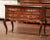 This elegant antique "Commode Sauteuse" was crafted in southern France, circa 1780. The fruitwood chest stands on cabriole...