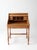 Vintage oak roll top secretary desk showcasing timeless craftsmanship and classic design. A gracefully curved tambour...