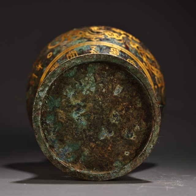This impressive lidded urn is masterfully crafted from heavy solid bronze with a rich, mottled green and brown patina. It...