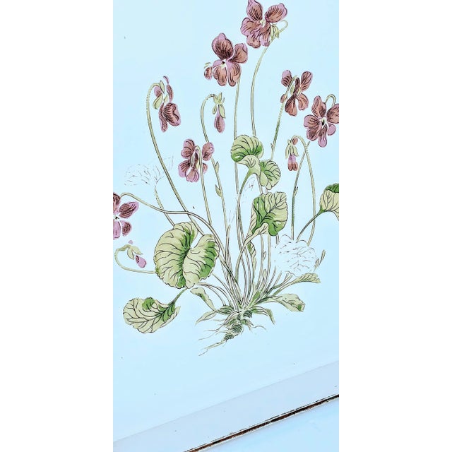 Elevate your decor with this stunning painted acrylic tray, showcasing vibrant green, purple, and violet graphics that are...