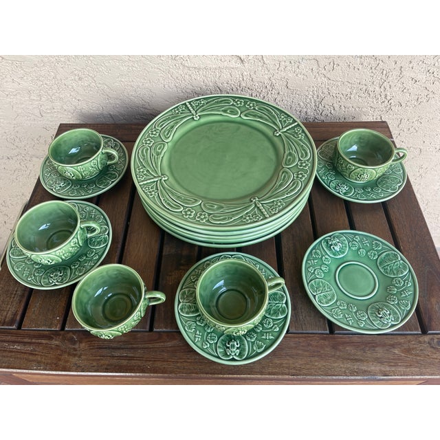 This is a set of Bordallo Pinheiro Dragonfly Green Majolica dinnerware. These items are collectible pieces of Portuguese...