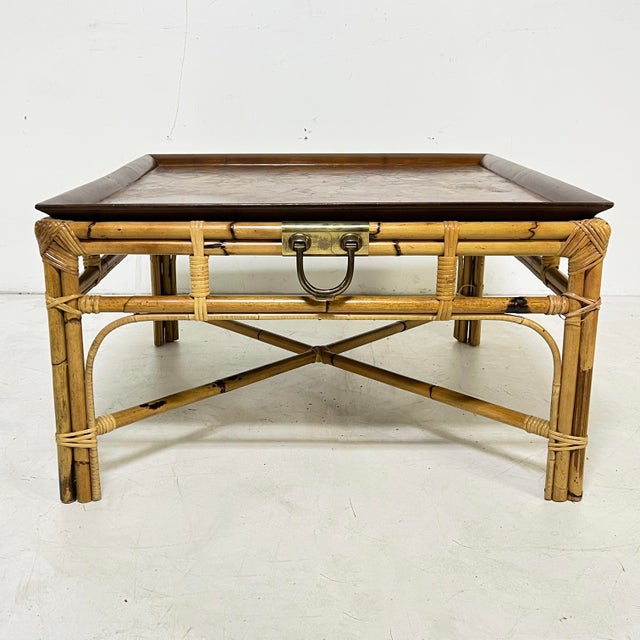 1970s Italian wrapped bamboo and oyster burl coffee table, all four sides fitted with brass lift handles.