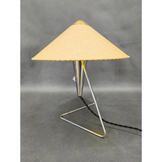 Elegant mid-century modern table lamp designed by helena frantová and produced in czechoslovakia during the 1960s. The...