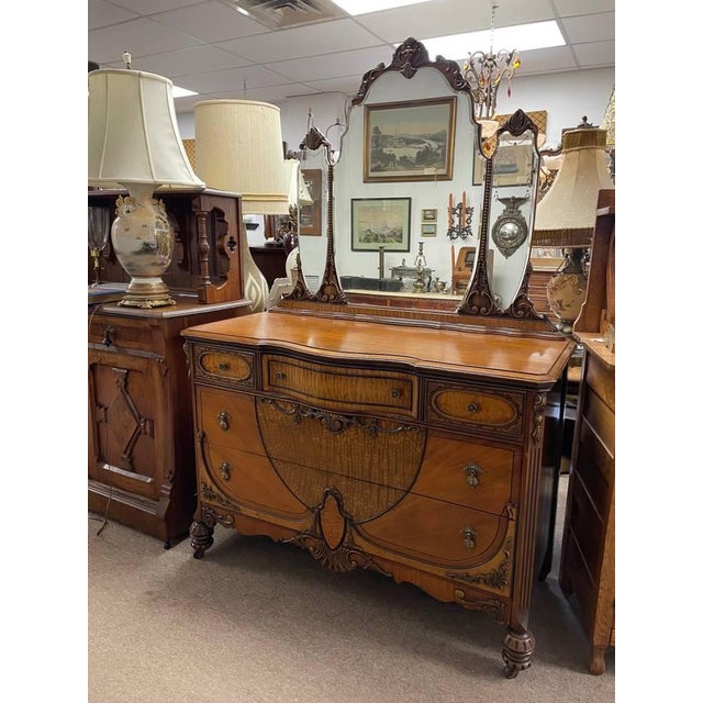 Up for sale is a beautiful antique Mirrored dresser that from roughly the late 1930's. The piece is beautifully detailed,...