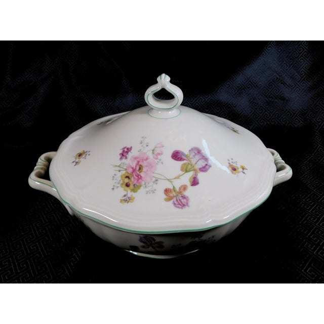 This is a footed round covered casserole dish by Rosenthal with a 1934/1935 backstamp in the Chippendale pattern with...