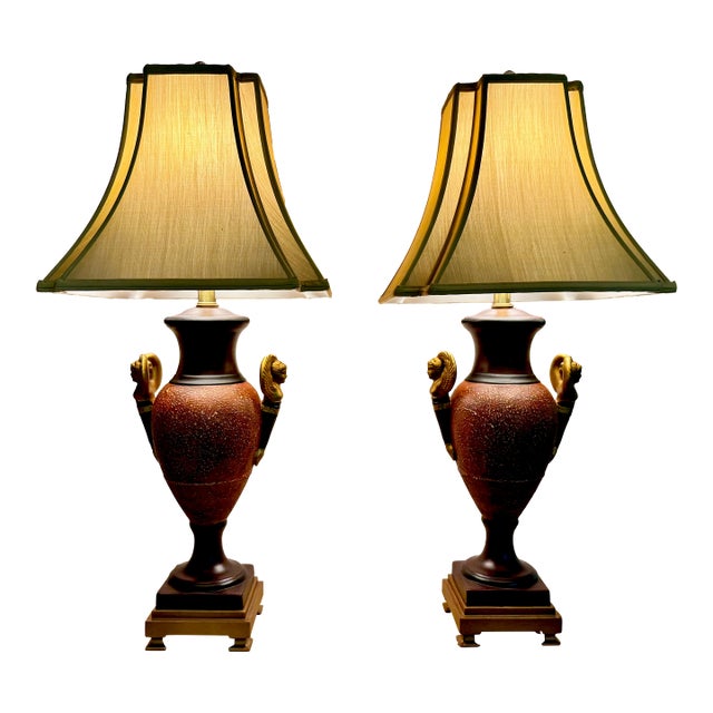 Pair of Designer Neoclassical Urn Lamps With Winged Cherubs & Brass Accent For Sale