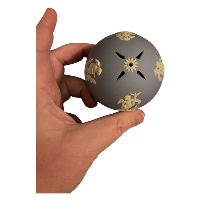 Vintage Wedgwood blue jasperware pomander ball with a potpourri sachet inside (still has faint scent). White cherub raised...