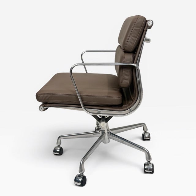 A beautifully restored Eames Aluminum Group Soft Pad Management Chair, designed by Charles and Ray Eames for Herman...