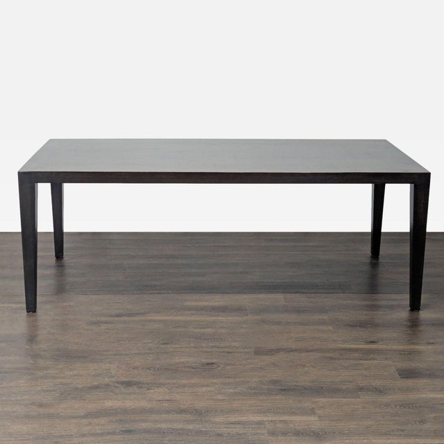 Bamboo table with tapered legs. Brand: Room & Board. Dimensions (in): 80W x 38D x 29H.