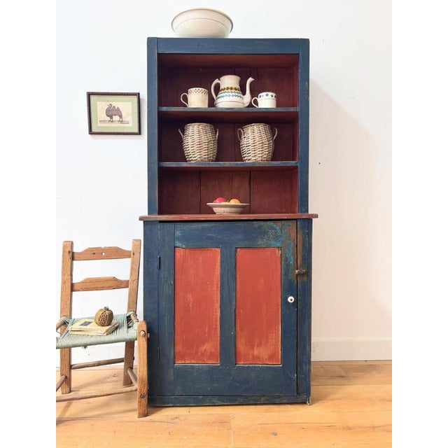 A provincial 19th century Swedish pine dresser. In dark blue and terracotta paint. Beautiful in its simplicity, colours...