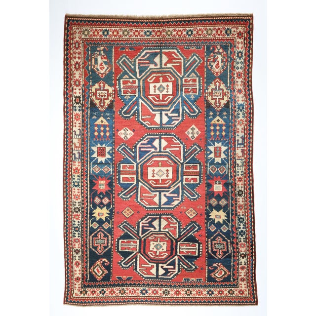 This is beautiful example of Karabagh rug from late 19th C. İt has three medallions so because of the medallions, between...