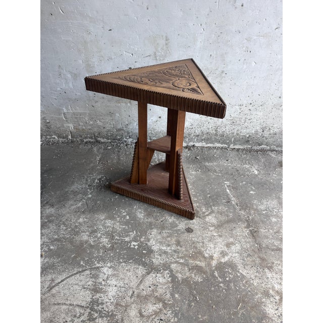 A striking French Art Nouveau side table dating from around 1915, crafted in wood and distinguished by its unusual...