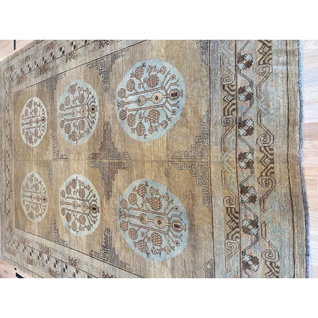 Vintage Khotan rugs are exquisite pieces of woven art that hail from the ancient oasis city of Khotan, located along the...
