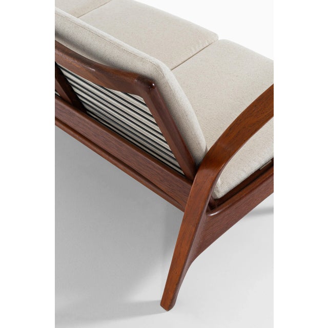 - Rare sofa designed by Rolf Rastad & Adolf Relling - Produced by Arnestad Bruk in Norway - Teak and reupholstered in wool...