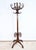 Parrot coat rack, model n°10.401, in curved beech in mahogany tone by Thonet. Founded by Michael Thonet (1796-1871), the...
