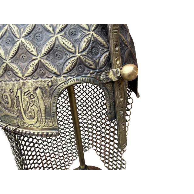 Crafted entirely by hand in the centuries-old tradition of Ottoman armory, this brass display helmet is not a...