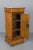 A 19th century French Charles X Period side table or nightstand, made of veneer of bird's-eye maple over solid oak...