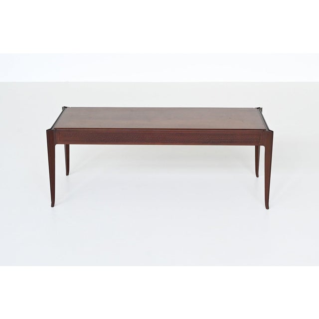 Beautiful elegant shaped Italian coffee table in the style of Vittorio Dassi, Italy 1960. This very nice long coffee table...