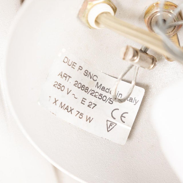 A unique 20th century ceiling light, designed in the form of a light bulb. The hand-blown glass features a smooth satin...