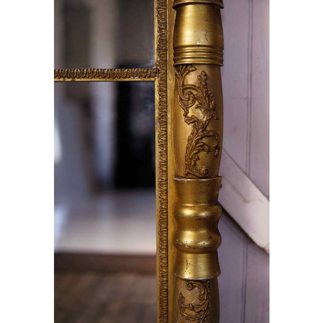 Antique large federal era giltwood mirror. Hand carved detail throughout. • Please note:Upper mirror is not original.