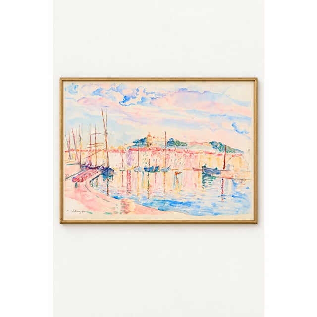 This pastel French Riviera harbor art print by Henri Lebasque captures the luminous waterfront of Saint-Tropez in soft...