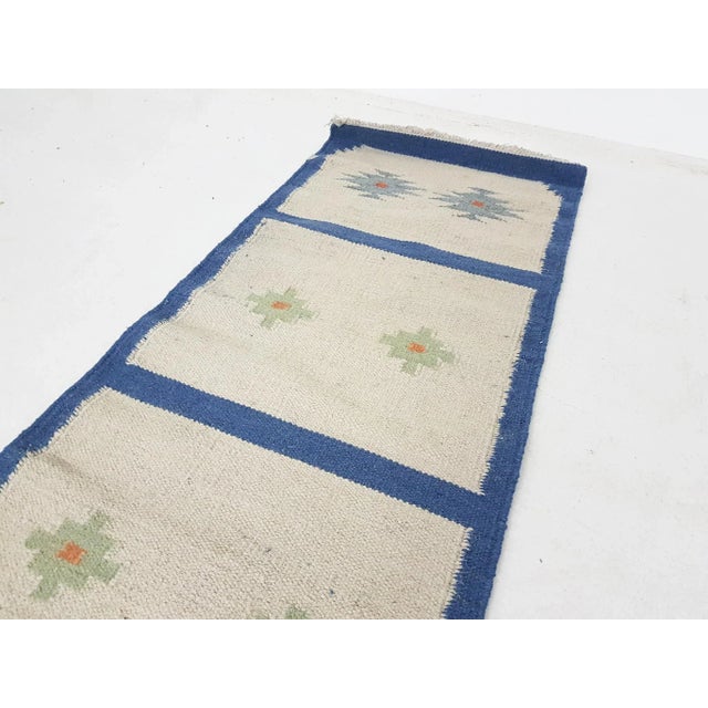 Vintage Indian Woolen Rug, in Good conditions. Designed 1950 to 1959 This piece is attributed to the mentioned...