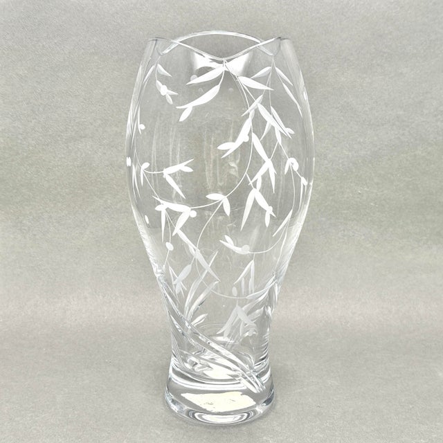 Lenox "Opal Innocence" non-lead crystal vase featuring an etched vine design and scalloped rim. Made in Poland with...