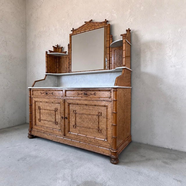 An exceptional and highly unusual late 19th Century French marble-topped meuble de toilette or dressing cabinet, veneered...