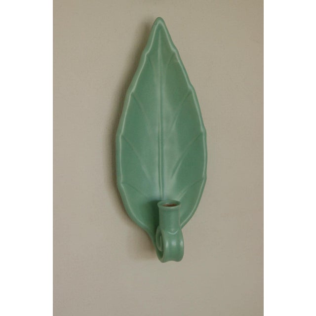Made in Sweden Pair of beautiful ceramic sconces designed by Bo Fajans, featuring a beautiful pastel glaze and elegant...