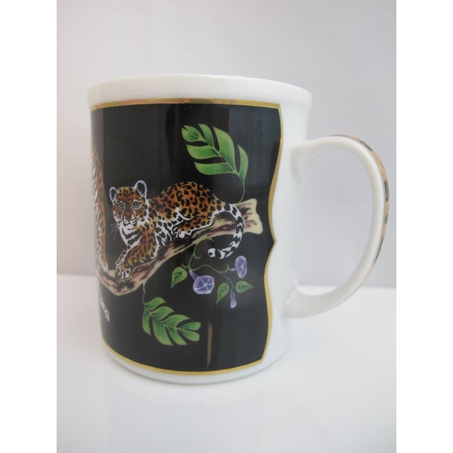 Incredibly sweet porcelain coffee cup from the Lynn Chase 1988 "Jaguar Jungle" collection. White porcelain shows a mama...