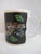 Incredibly sweet porcelain coffee cup from the Lynn Chase 1988 "Jaguar Jungle" collection. White porcelain shows a mama...