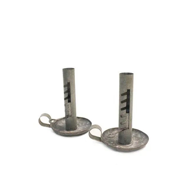 Chambersticks are a very unique type of candle holder because they were designed to be carried. Add some old-world vintage...