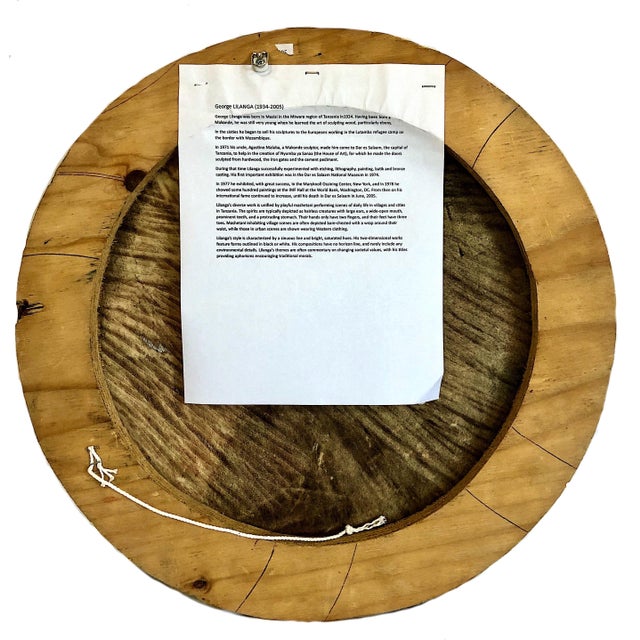 Brick Red Tanzanian Spirits on a Painted and Carved Circular Wood Relief, Signed by George Lilanga For Sale - Image 8 of 9