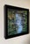 Contemporary Still Waters I by Elena Degenhardt | Oil on canvas depicting a serene body of water with greenery. For Sale - Image 3 of 3