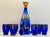 Decanter measures 11 1/2 inches tall, 2 1/4 inches at the foot, 3 at its widest point and 2 at its opening. Glasses...