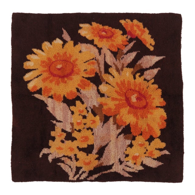Hand-knotted in wool, this vintage 6x7 Turkish square rug dates to circa 1950–1960 and features a high-pile floral design...