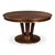 A broad circular top and flared pedestal give the table a composed, sculptural presence. The broad circular top and rich...