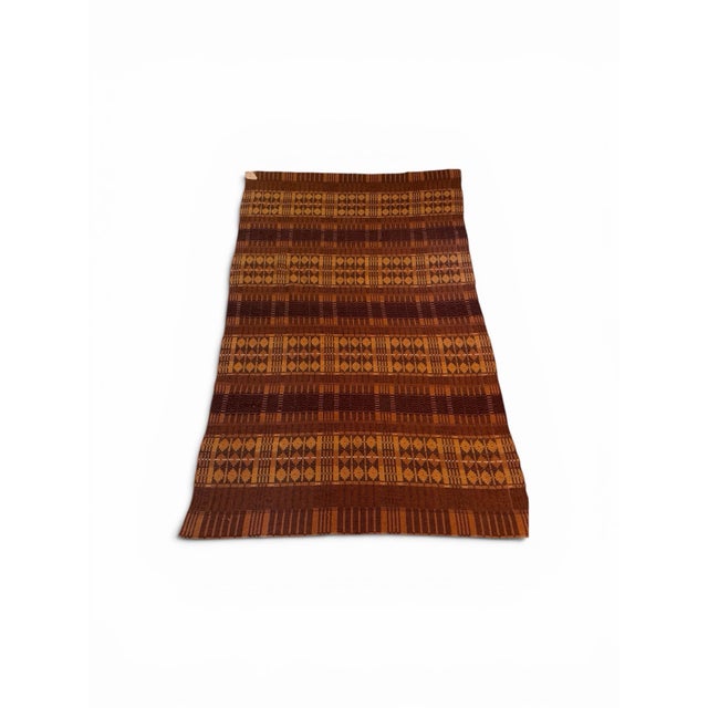 Add instant warmth, rich texture, and graphic impact to your space with this stunning vintage woven textile. Featuring a...