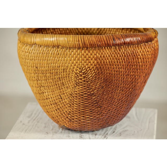 Vintage Chinese Handwoven Rattan Carrying Basket with Arched Handle For Sale - Image 12 of 18