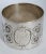 Add timeless elegance to your table setting with this antique sterling silver napkin ring, featuring exquisite hand-...